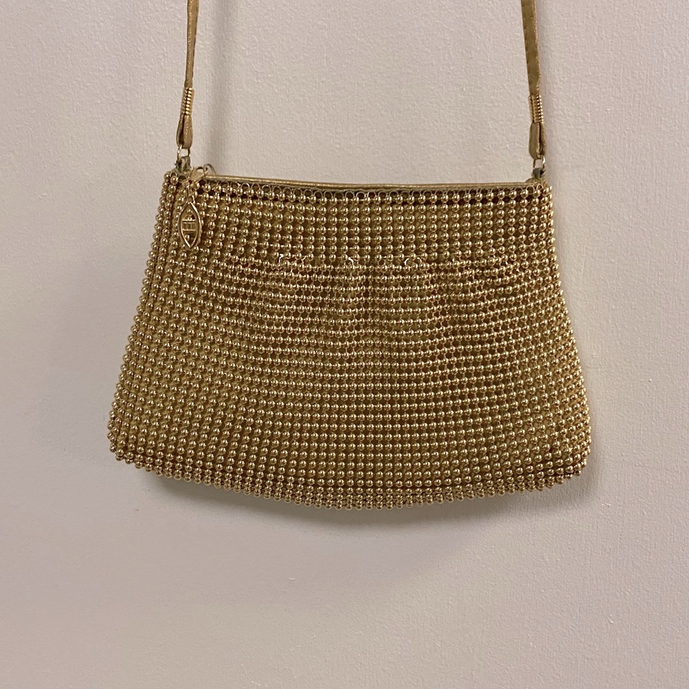 Women’s gold beaded purse